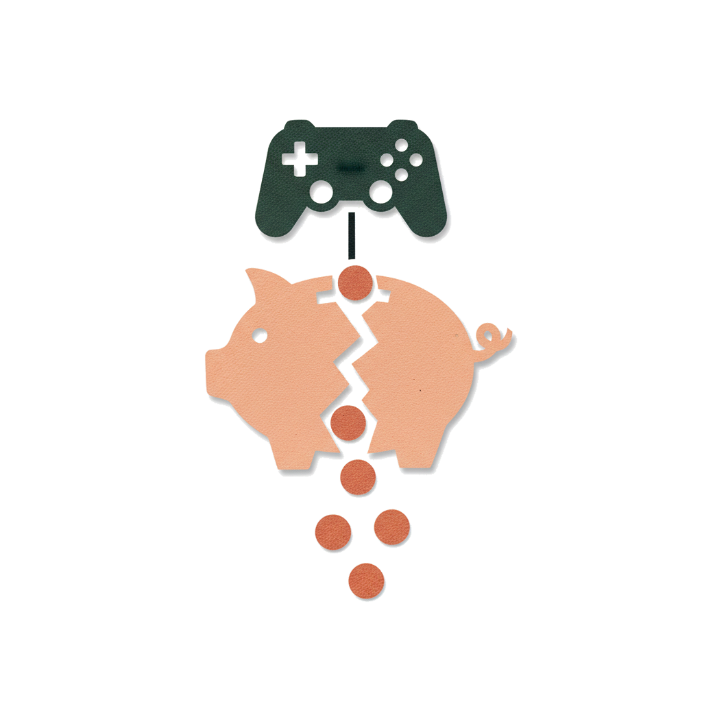 Un piccolo salvadanaio con qualche moneta sparsa intorno